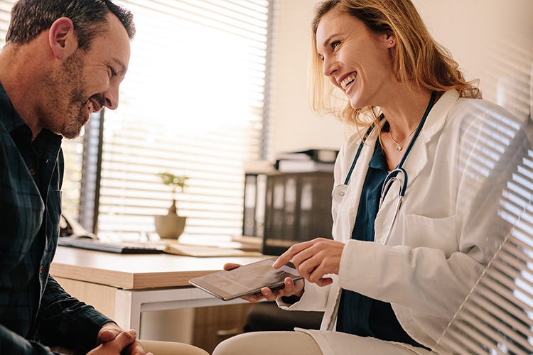 tablet-patient-clinician-joyful-750x500